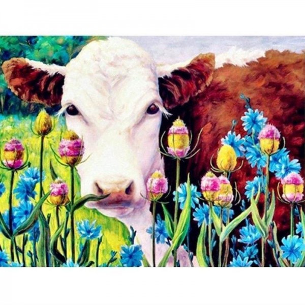Ko med blomster