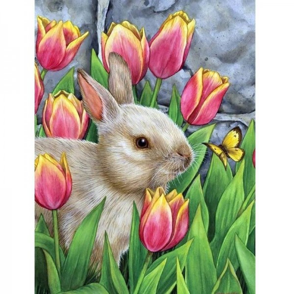 Kanin mellem tulipaner