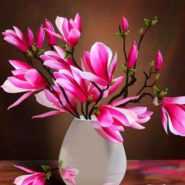 Lyserøde blomster i vase